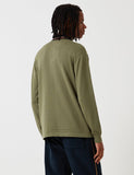 Stussy Perry Zip Langarm Knit Polo-Hemd - Olivgrün