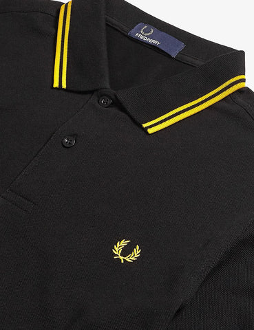 Fred Perry mit Doppelstreifen-Polo-Hemd - Schwarz / New Yellow